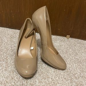 Nude close-toed high heels